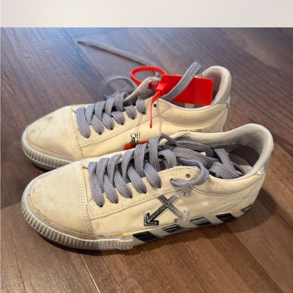 Off-White Cream and Gray Sneakers with Red Tag